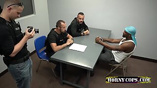 DIrty gay white cop loves black cock so he takes him to the interrogation room.